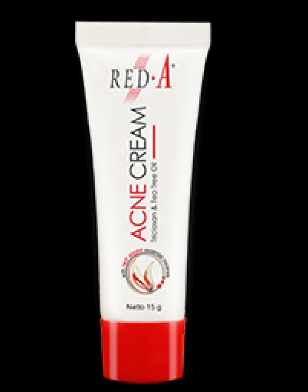 red acne cream